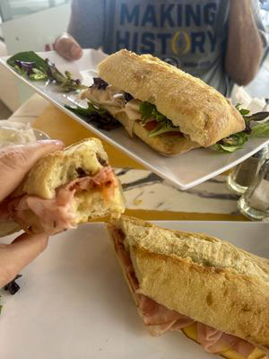 Pressed warm panini on fresh-baked Italian bread